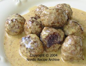 Meatballs cooked in cream sauce