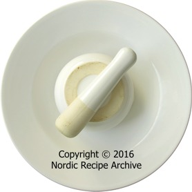 Weight placed on top of dish